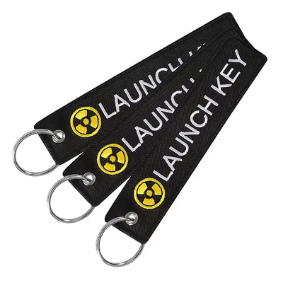 Wiersz brukowany Wiersz brukowany podwójnie wyłożony Jacquard Weave Logo Woven Label Key Ring