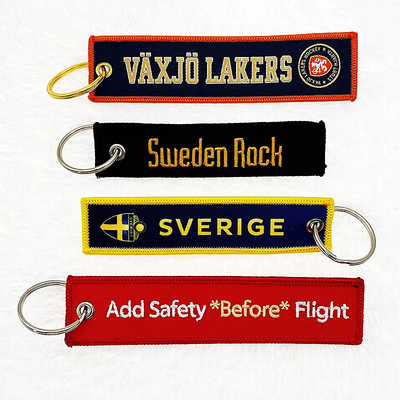 Wiersz brukowany Wiersz brukowany podwójnie wyłożony Jacquard Weave Logo Woven Label Key Ring