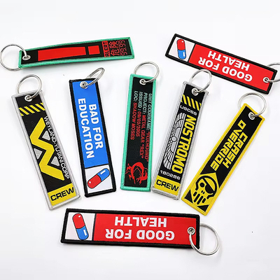 Zindywidualizowane drukowanie litery alfabetu podwójnie boczne łańcuchy kluczyki Woven Embroidered Keychain Short Lanyard Key Tags