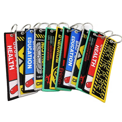 Zindywidualizowane drukowanie litery alfabetu podwójnie boczne łańcuchy kluczyki Woven Embroidered Keychain Short Lanyard Key Tags