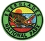 Park Narodowy Everglades Niestandardowa haftowana naszywka Żelazko na podłożu Twill Fabric Background